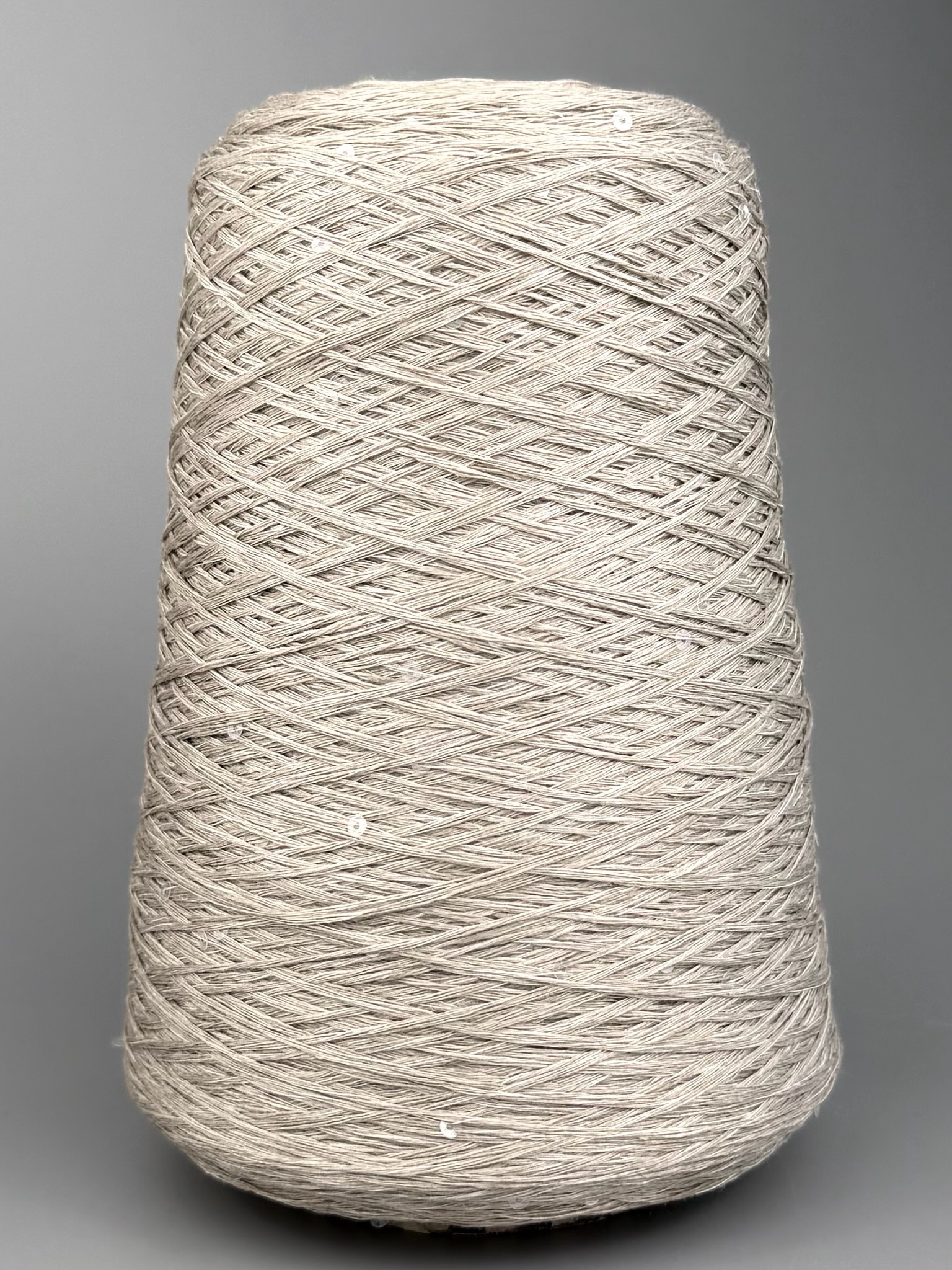 Art. Lino – 100% Leinengarn mit Pailletten col. Perlgrau 580 m / 100 g foto 2